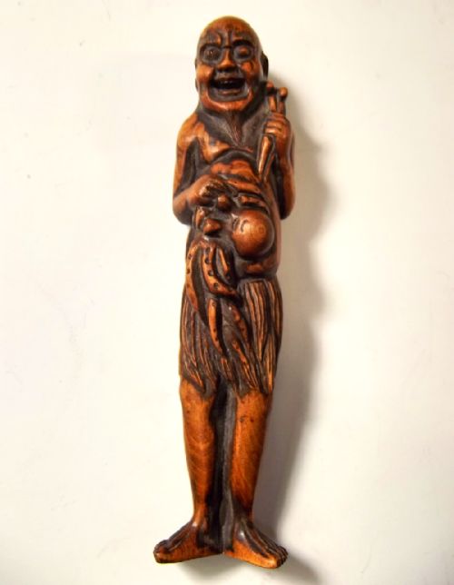 japanese boxwood netsuke sennin with octopus - CATEGORY: ANTIQUE MISCELLANEOUS - DATED 1880