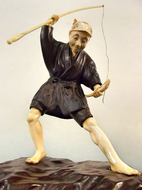 JAPANESE MEIJI PERIOD MIXEDMEDIA BRONZE IVORY AND HARDWOOD FISHERMAN OKIMONO - ADDITIONAL PHOTO 1
