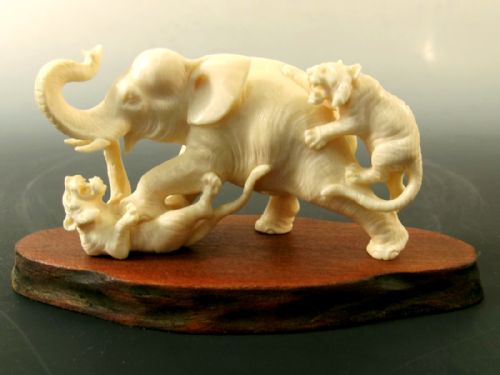 japanese meiji period one piece ivory elephant and tigers okimono - CATEGORY: ANTIQUE MISCELLANEOUS - DATED 1890