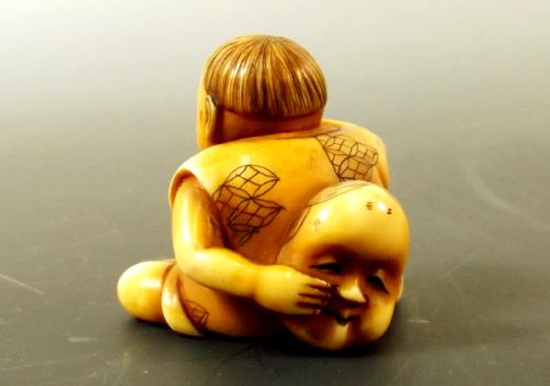 JAPANESE MEIJI PERIOD IVORY NETSUKE BOY WITH NOH MASK - ADDITIONAL PHOTO 2