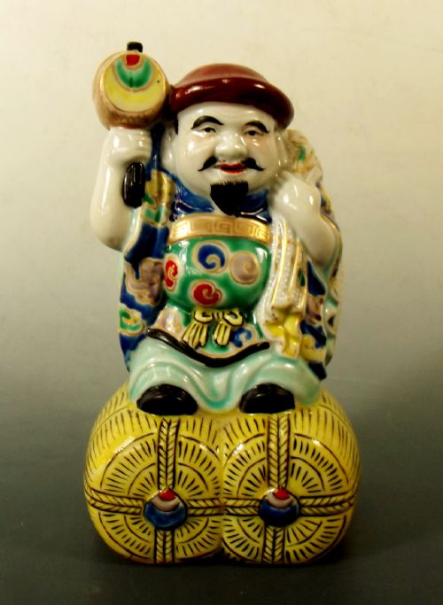 japanese meiji period kutani daikoku figurine - CATEGORY: ANTIQUE MISCELLANEOUS - DATED 1910