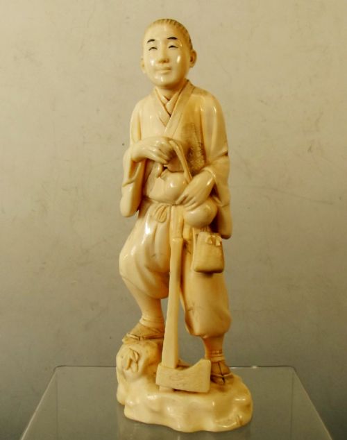 japanese meiji period carved ivory wood cutter okimono - CATEGORY: ANTIQUE MISCELLANEOUS - DATED 1890