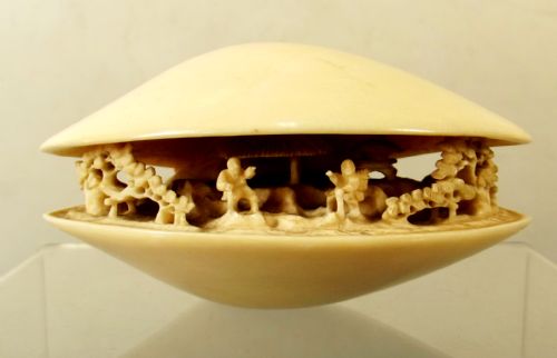 19th c chinese carved ivory world in a clam - CATEGORY: ANTIQUE MISCELLANEOUS - DATED 1880