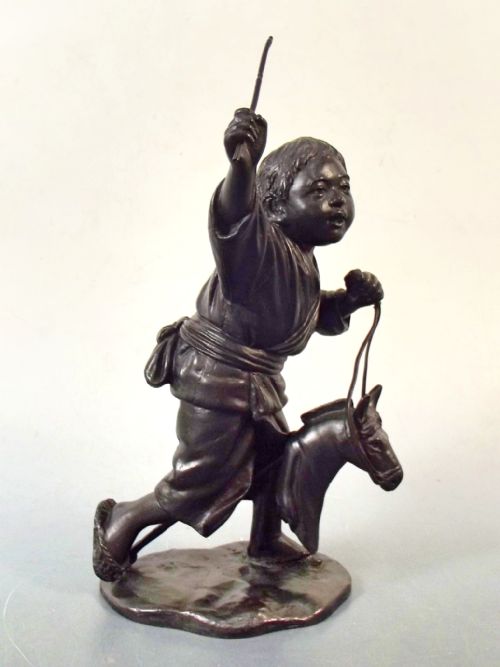 JAPANESE MEIJI PERIOD SIGNED BRONZE OF BOY WITH HOBBY HORSE OKIMONO - ADDITIONAL PHOTO 4