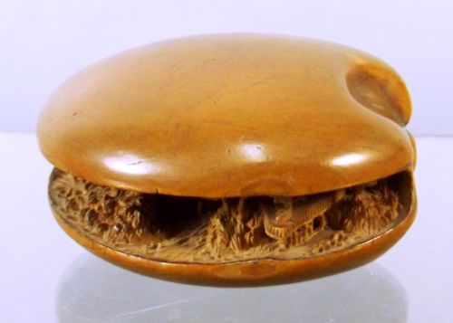 japanese meiji period boxwood world in a clam netsuke - CATEGORY: ANTIQUE MISCELLANEOUS - DATED 1880