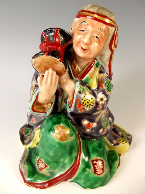 japanese meiji period kutani figure of a female drummer - CATEGORY: ANTIQUE CERAMICS - DATED 1900