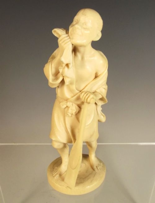 japanese meiji period carved ivory okimono of an oarsman - CATEGORY: ANTIQUE MISCELLANEOUS - DATED 1890