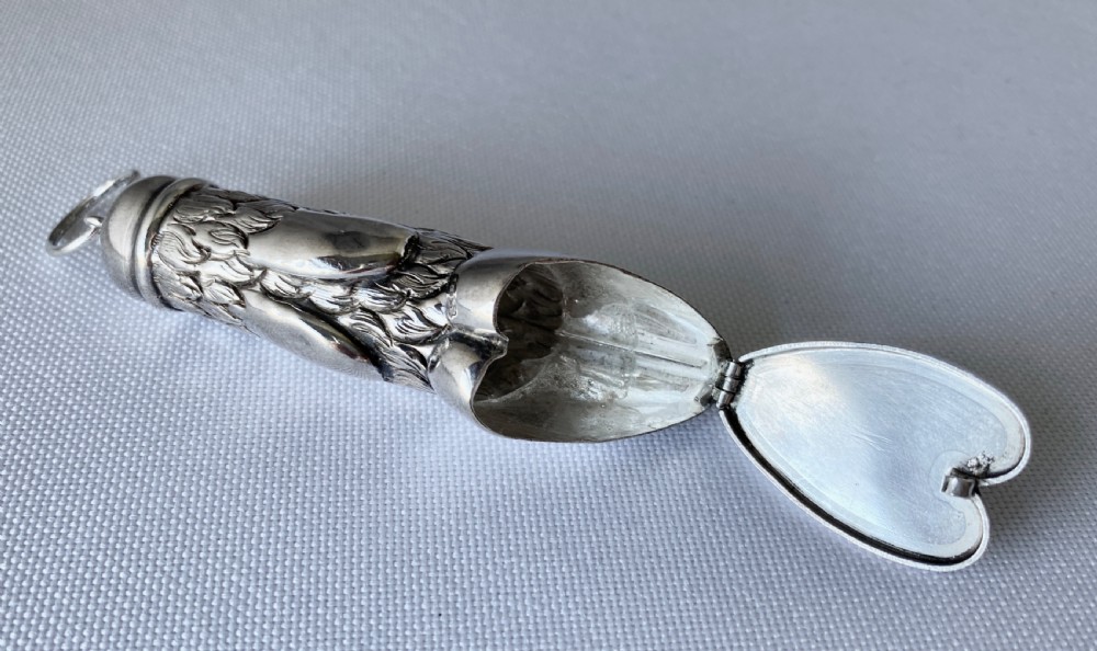 A Late Victorian sterling silver novelty vesta case fashioned in the form of a textured animal leg and hoof with a top suspension ring. View V