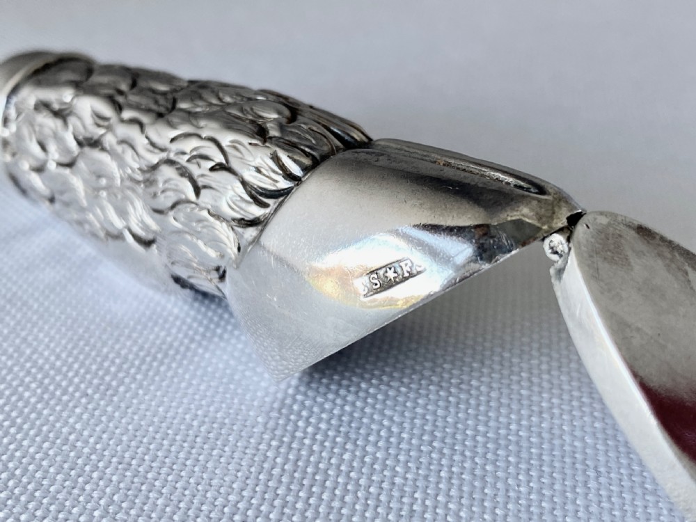 A Late Victorian sterling silver novelty vesta case fashioned in the form of a textured animal leg and hoof with a top suspension ring. View VII