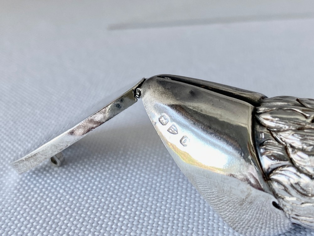 A Late Victorian sterling silver novelty vesta case fashioned in the form of a textured animal leg and hoof with a top suspension ring. View VIII