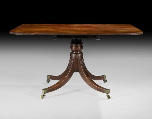 A GEORGE III MAHOGANY THREE PILLAR DINING TABLE - ADDITIONAL PHOTO 2