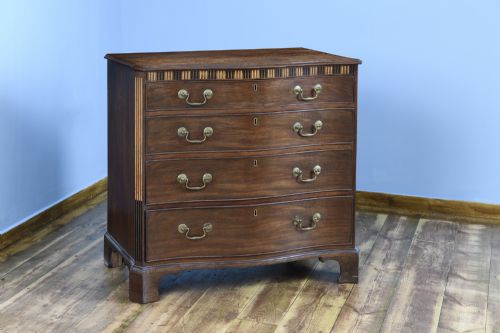 A GEORGE III MAHOGANY CHEST OF DRAWERS - ADDITIONAL PHOTO 1