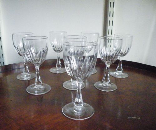 A SET OF 8 VICTORIAN CUT GLASS SHERRY GLASSES