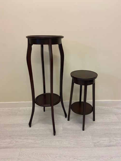 Non matching pair of plant stands 