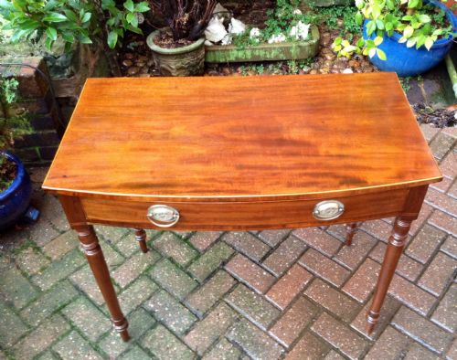 EARLY 19TH CENTURY BOW FRONT SIDE TABLE - ADDITIONAL PHOTO 1