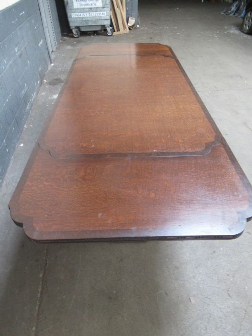 LARGE OAK EXTENDING DINING TABLE - ADDITIONAL PHOTO 3