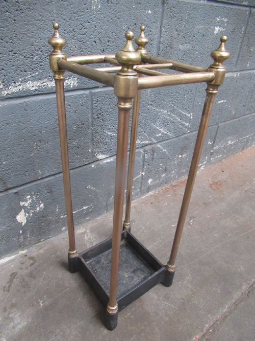 Edwardian Period   Brass and Cast Iron Stick Holder