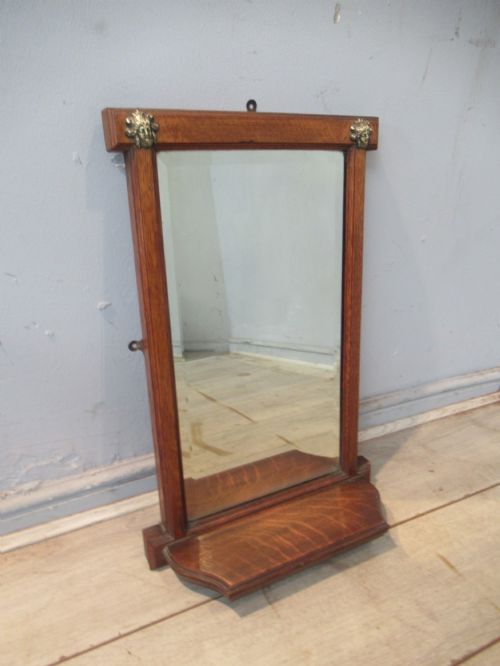 LATE VICTORIAN OAK FRAMED WALL MIRROR