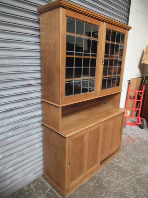 A LIGHT OAK BOOKCASE OR KITCHEN CUPBOARD - ADDITIONAL PHOTO 1