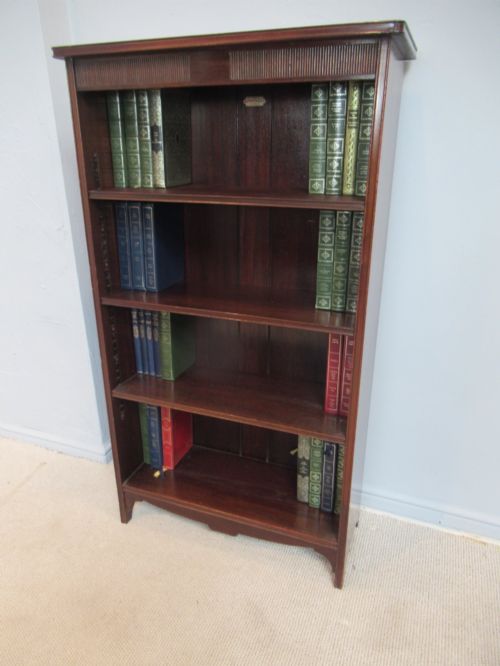 MAHOGANY OPEN BOOKCASE BY WARING AND GILLOWS