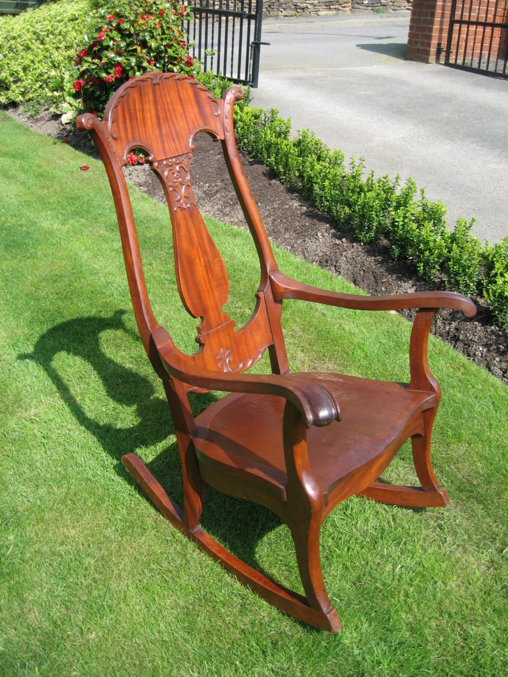 Mahogany rocking arm chair