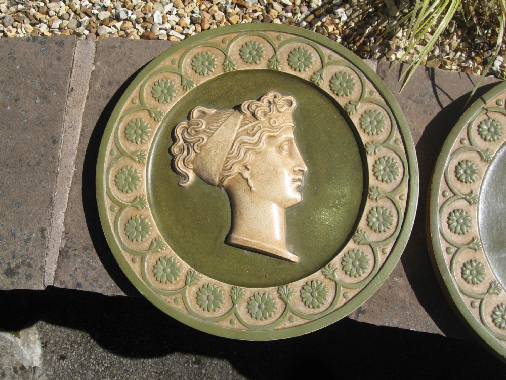 Set of four  circular roman  style  wall plaques View IV
