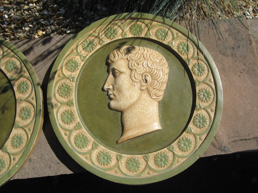 Set of four  circular roman  style  wall plaques View VI