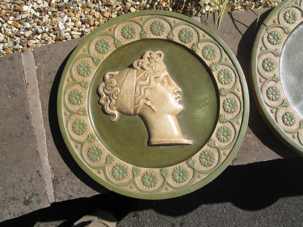Set of four  circular roman  style  wall plaques View VII