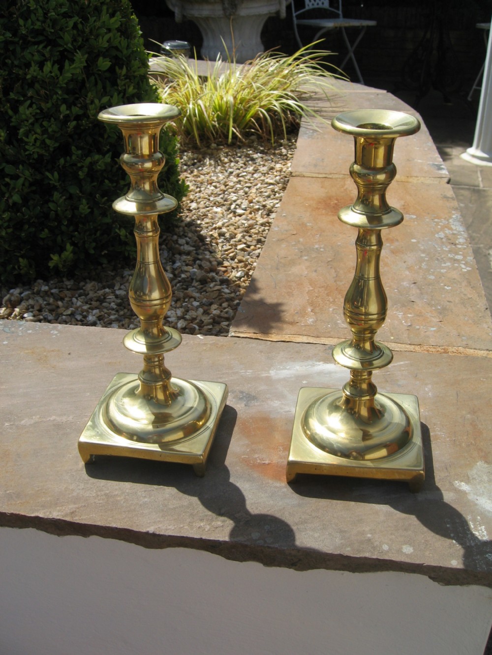 Attractive pair of 19th century brass candle sticks View III