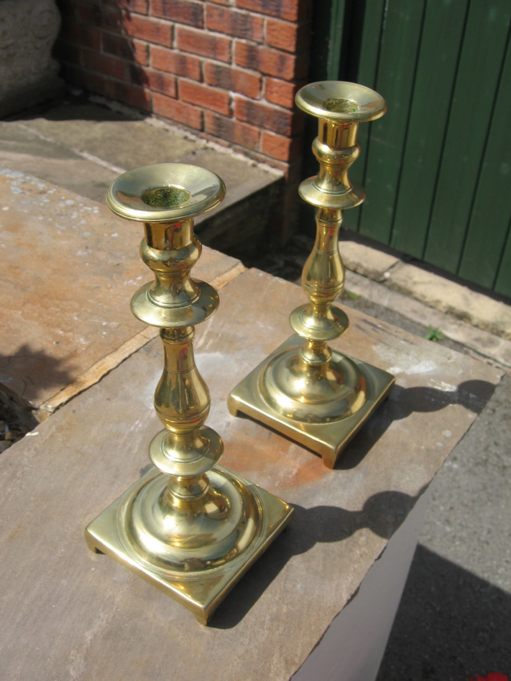 Attractive pair of 19th century brass candle sticks View IV