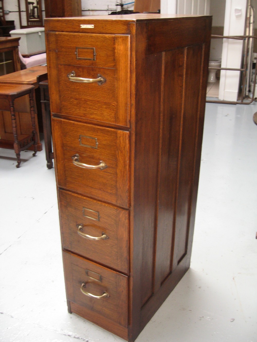 Oak four drawer file chest cabinet