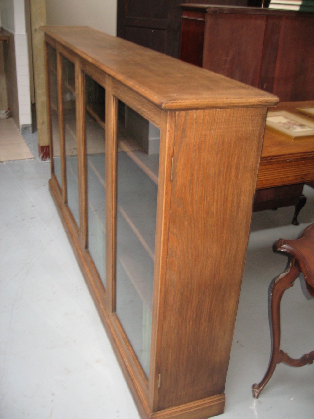 Large light oak  four door bookcase View III