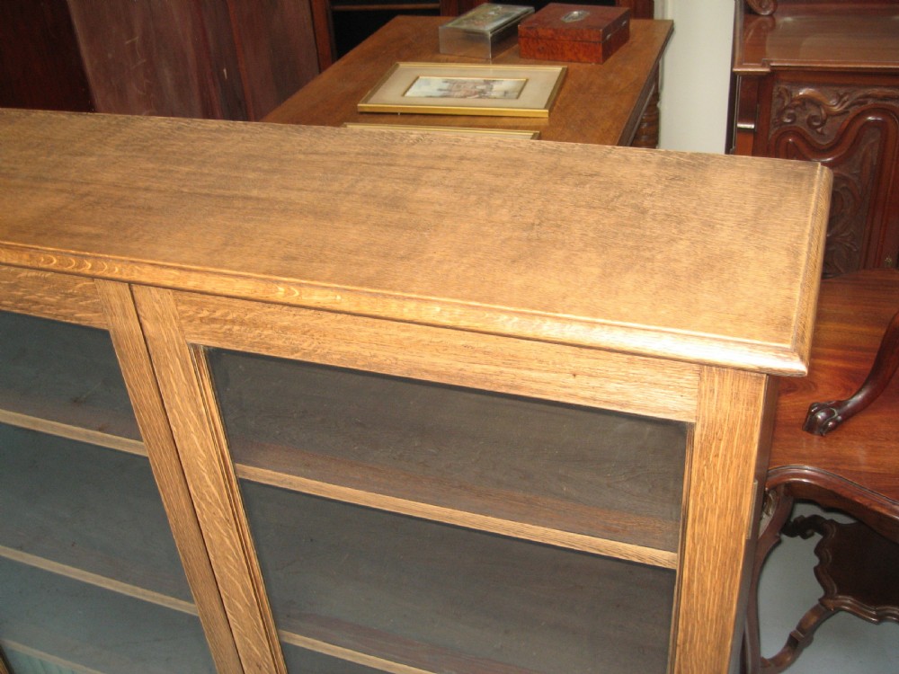Large light oak  four door bookcase View IV