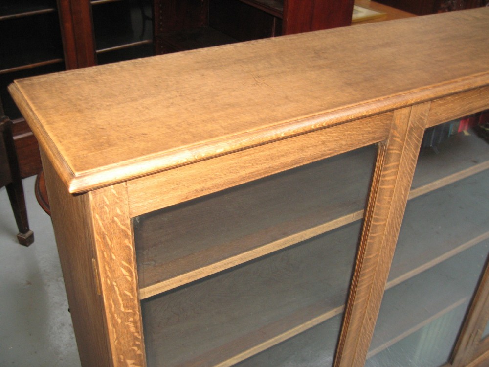 Large light oak  four door bookcase View V