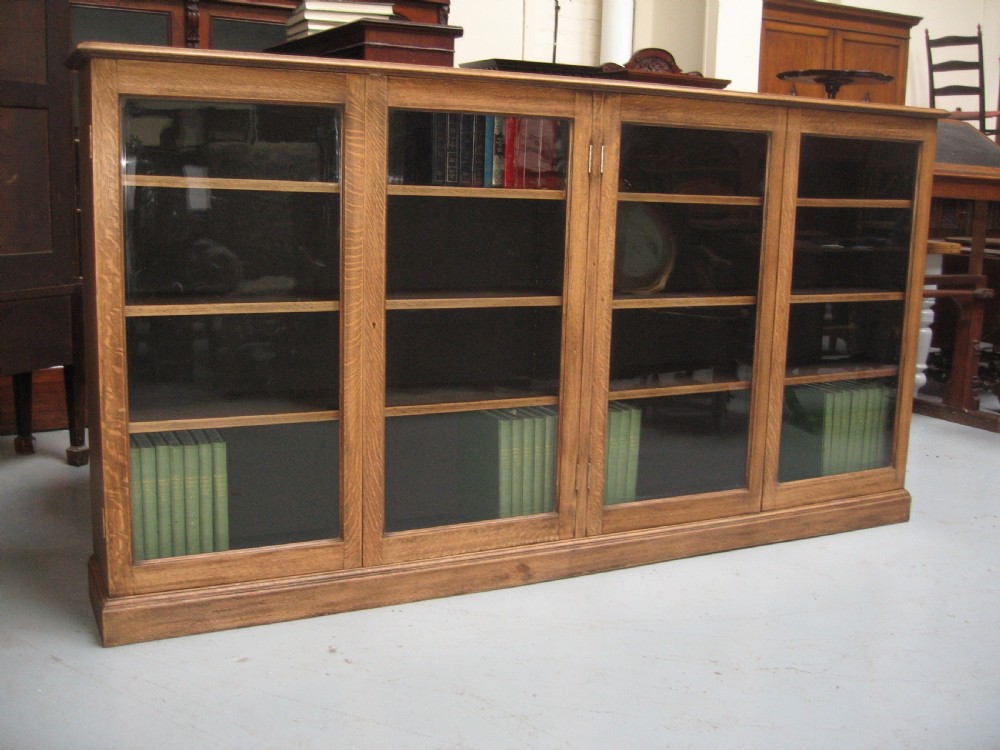 Large light oak  four door bookcase View VII