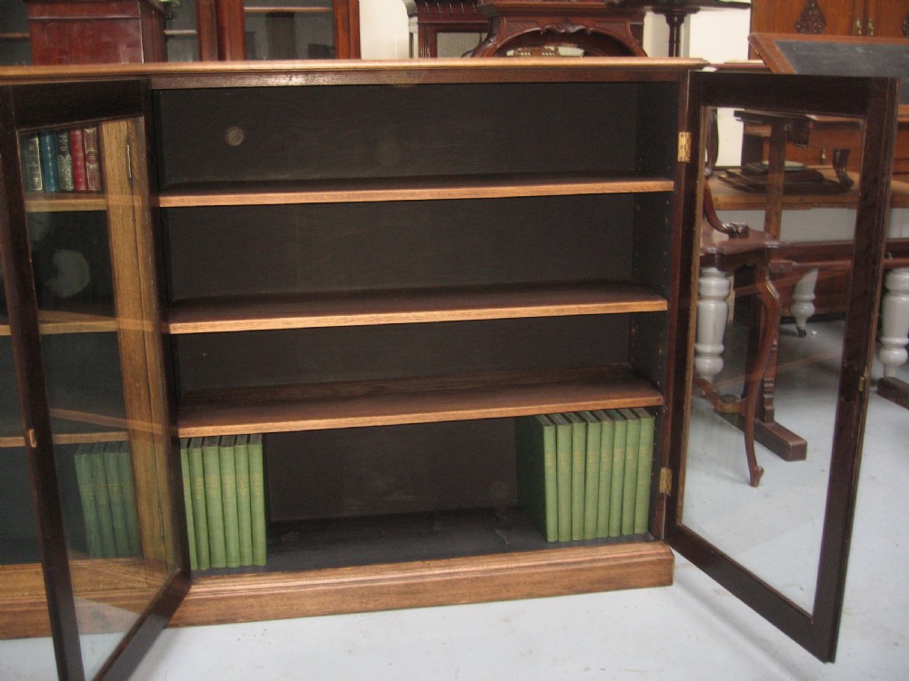 Large light oak  four door bookcase View VIII
