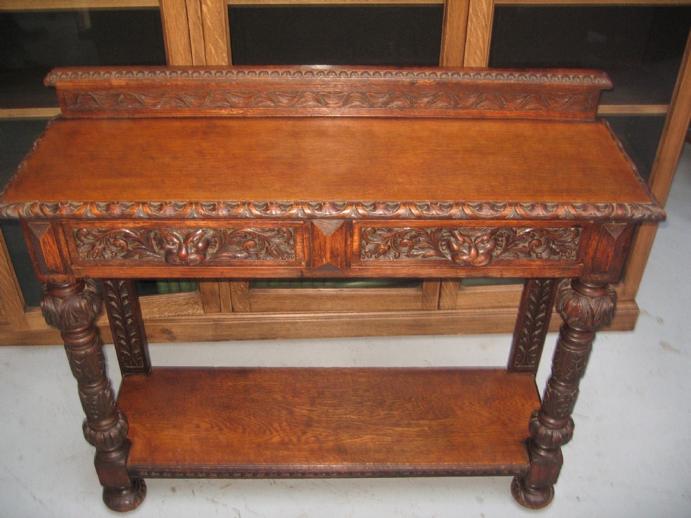Late Victorian carved oak side table