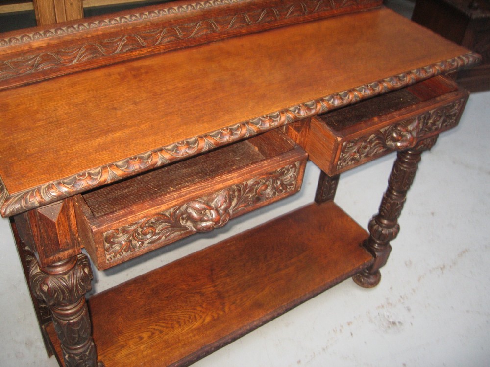 Late Victorian carved oak side table View IV