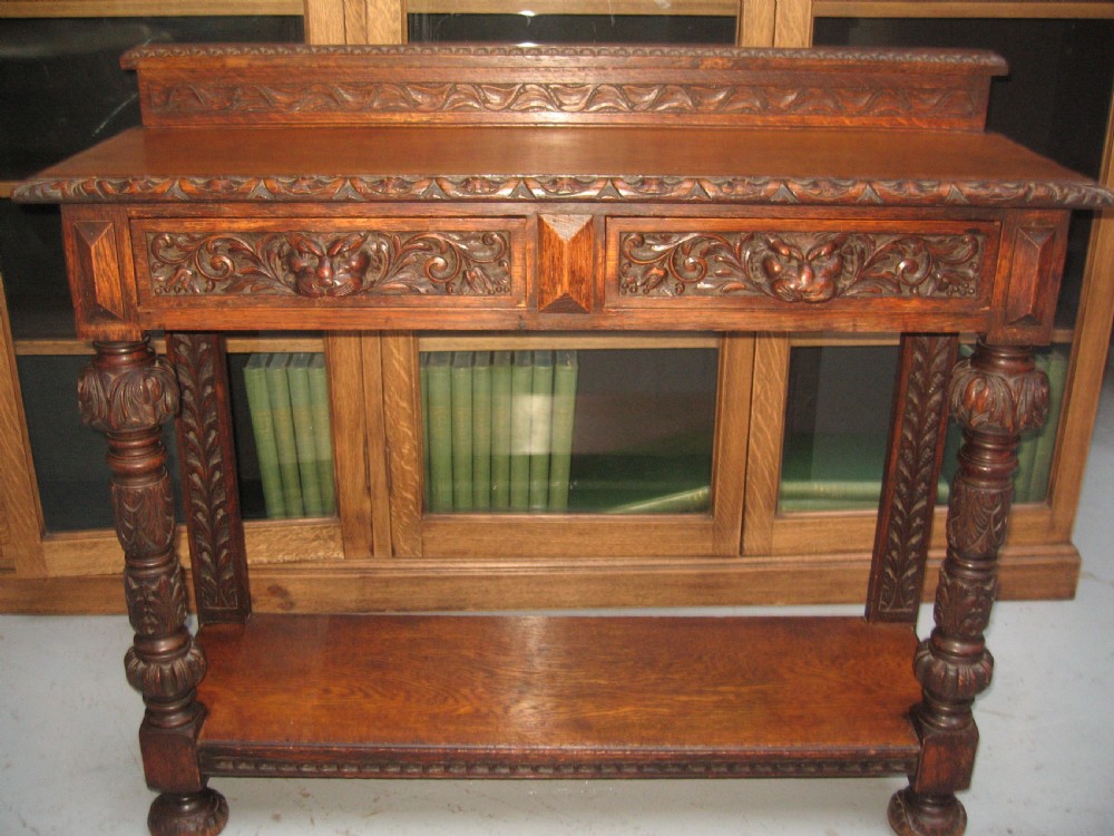 Late Victorian carved oak side table View VIII