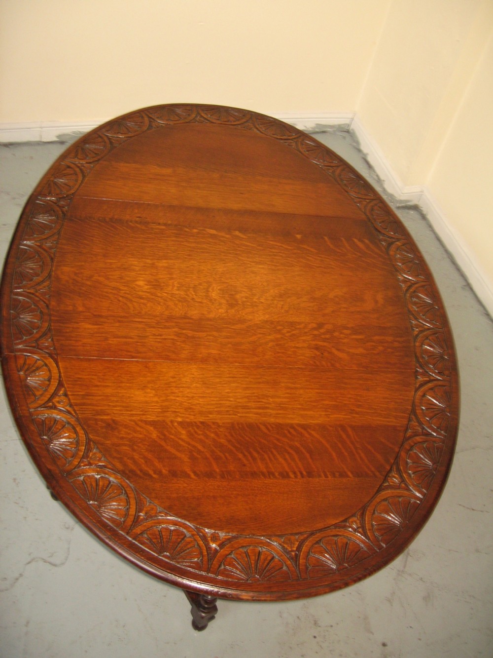Oval oak drop leaf dining table View II