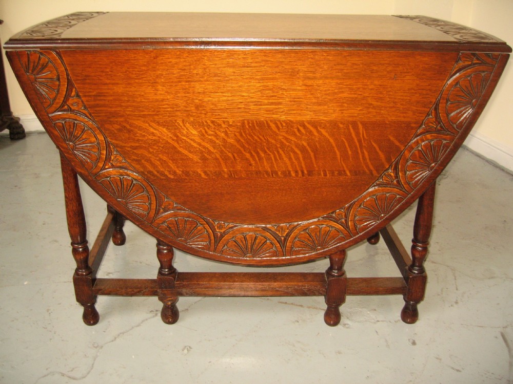 Oval oak drop leaf dining table View V