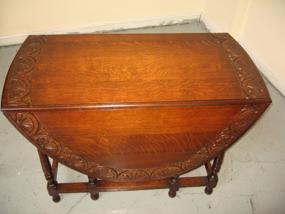 Oval oak drop leaf dining table View VI