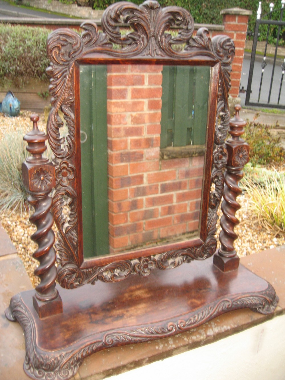 Victorian carved oak swing mirror