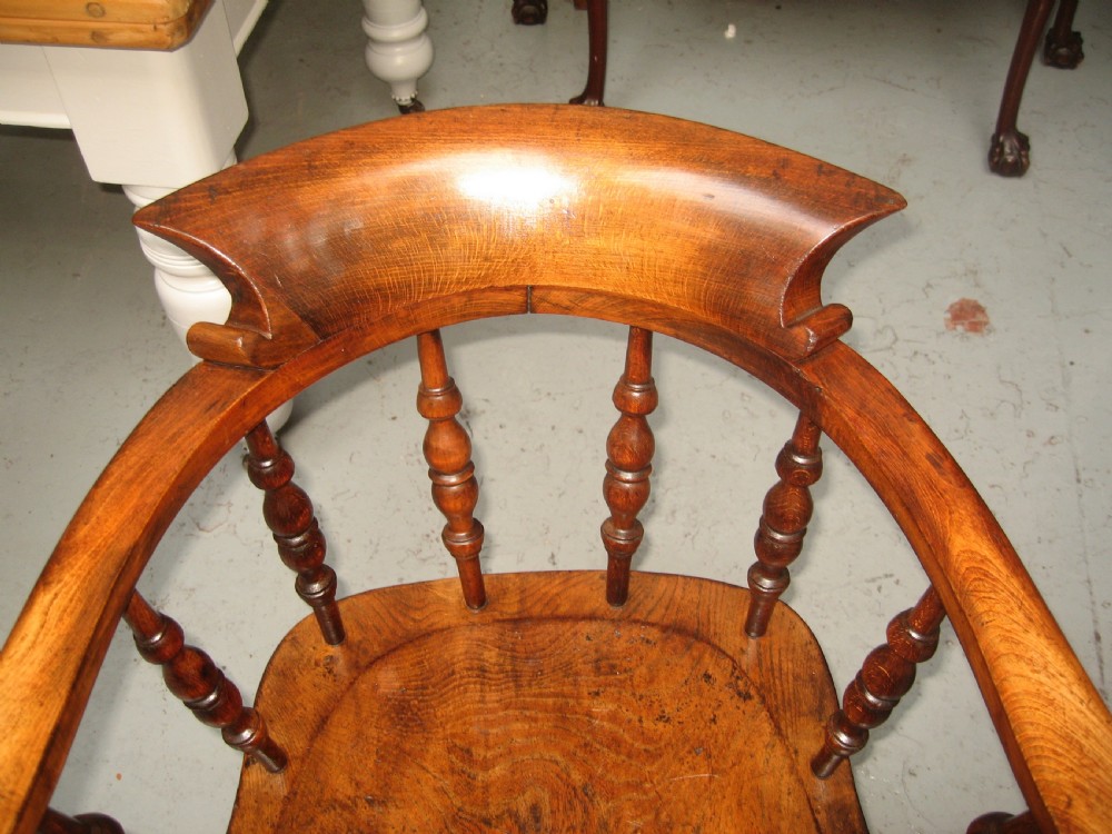 Pair of victorian smoker  bow arm chairs View III