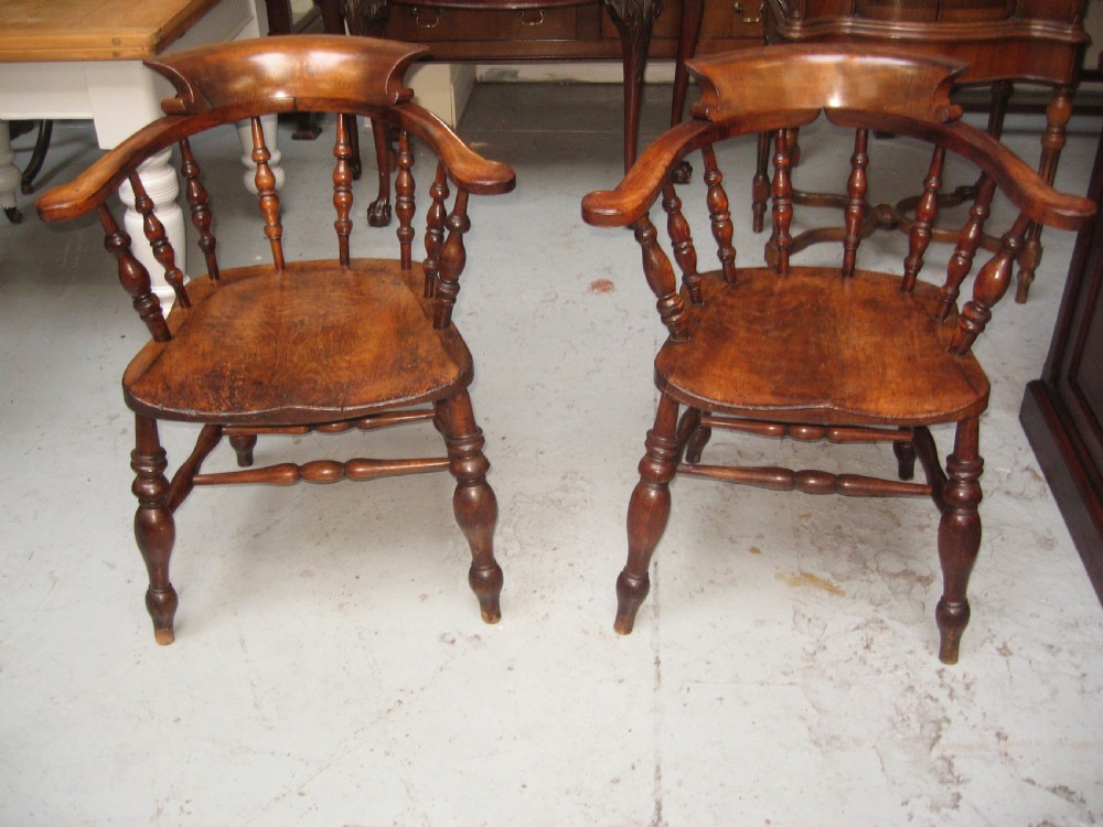 Pair of victorian smoker  bow arm chairs View VII