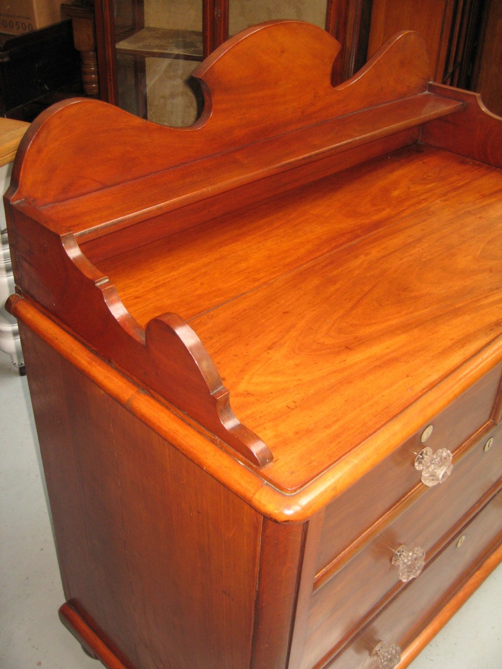 V ictorian mahogany  gallery back chest of drawers View II