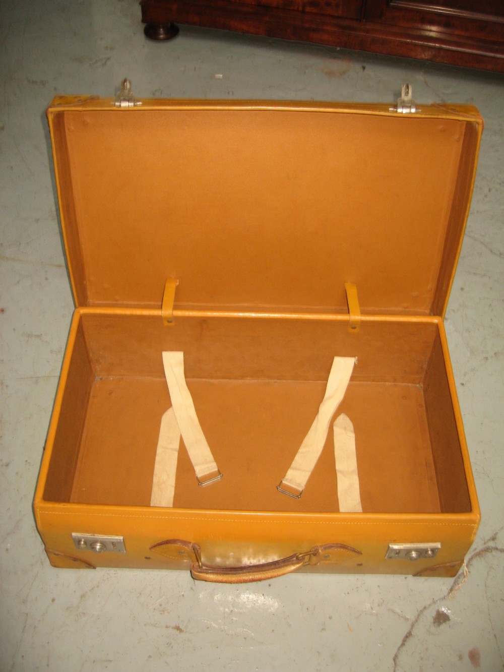 Light tan leather suit case View V