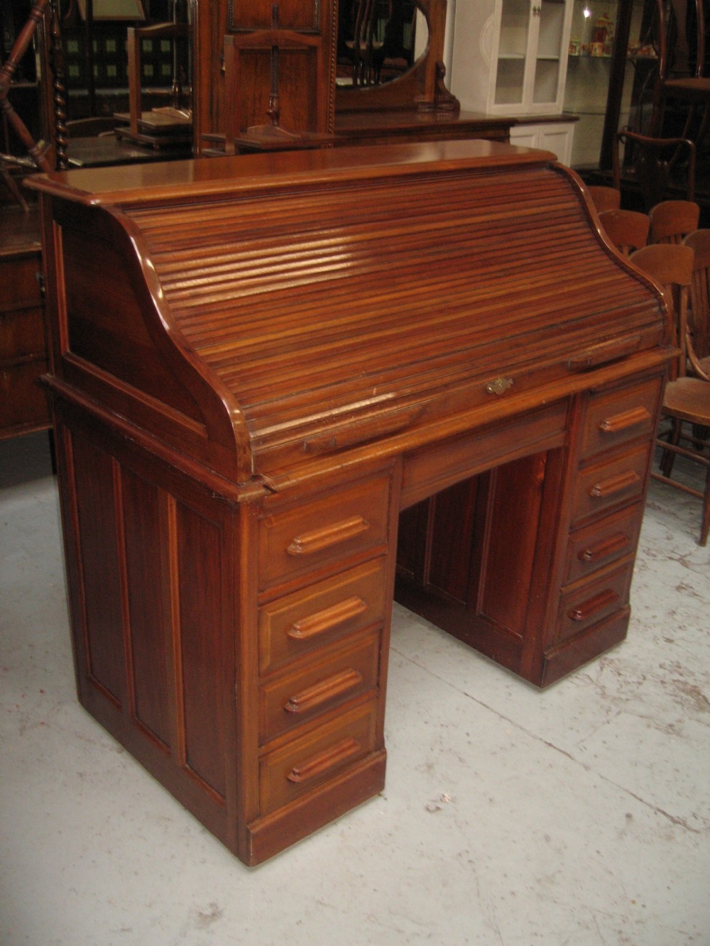 Mahogany roll top desk