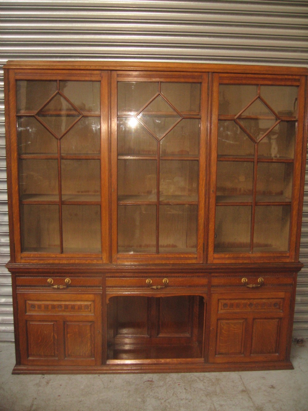 Oak three door bookcase