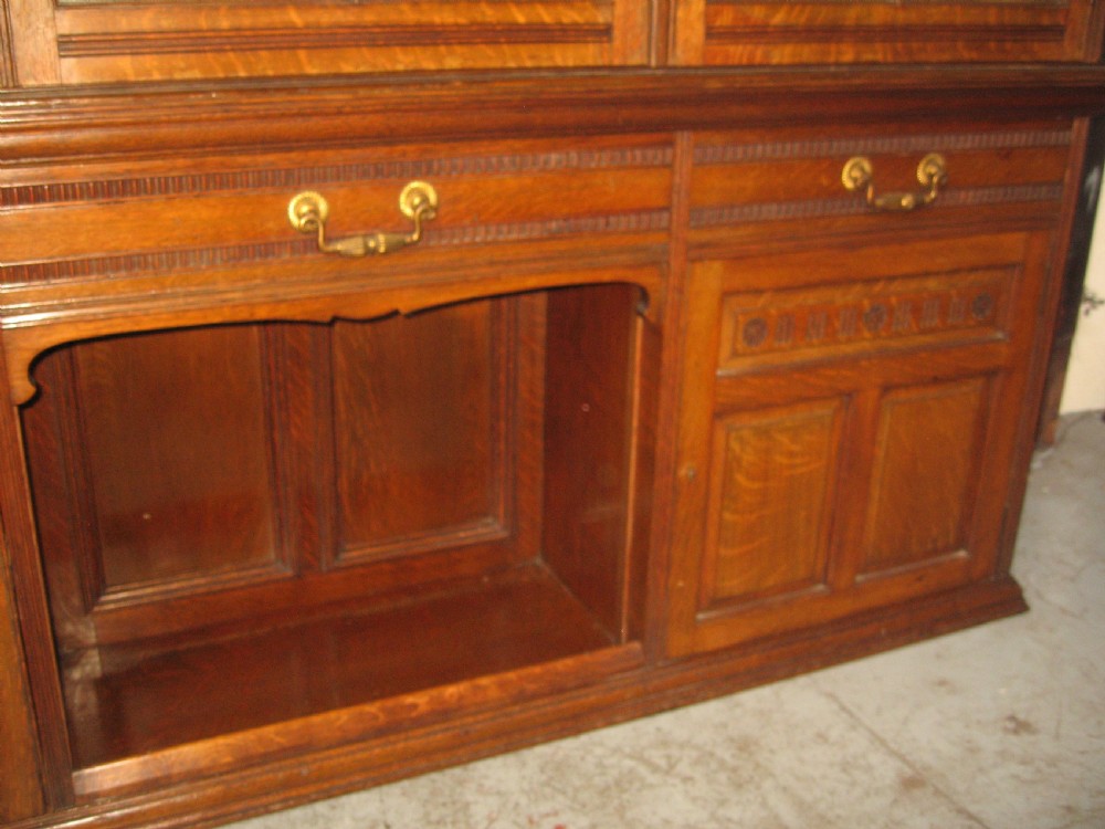 Oak three door bookcase View III
